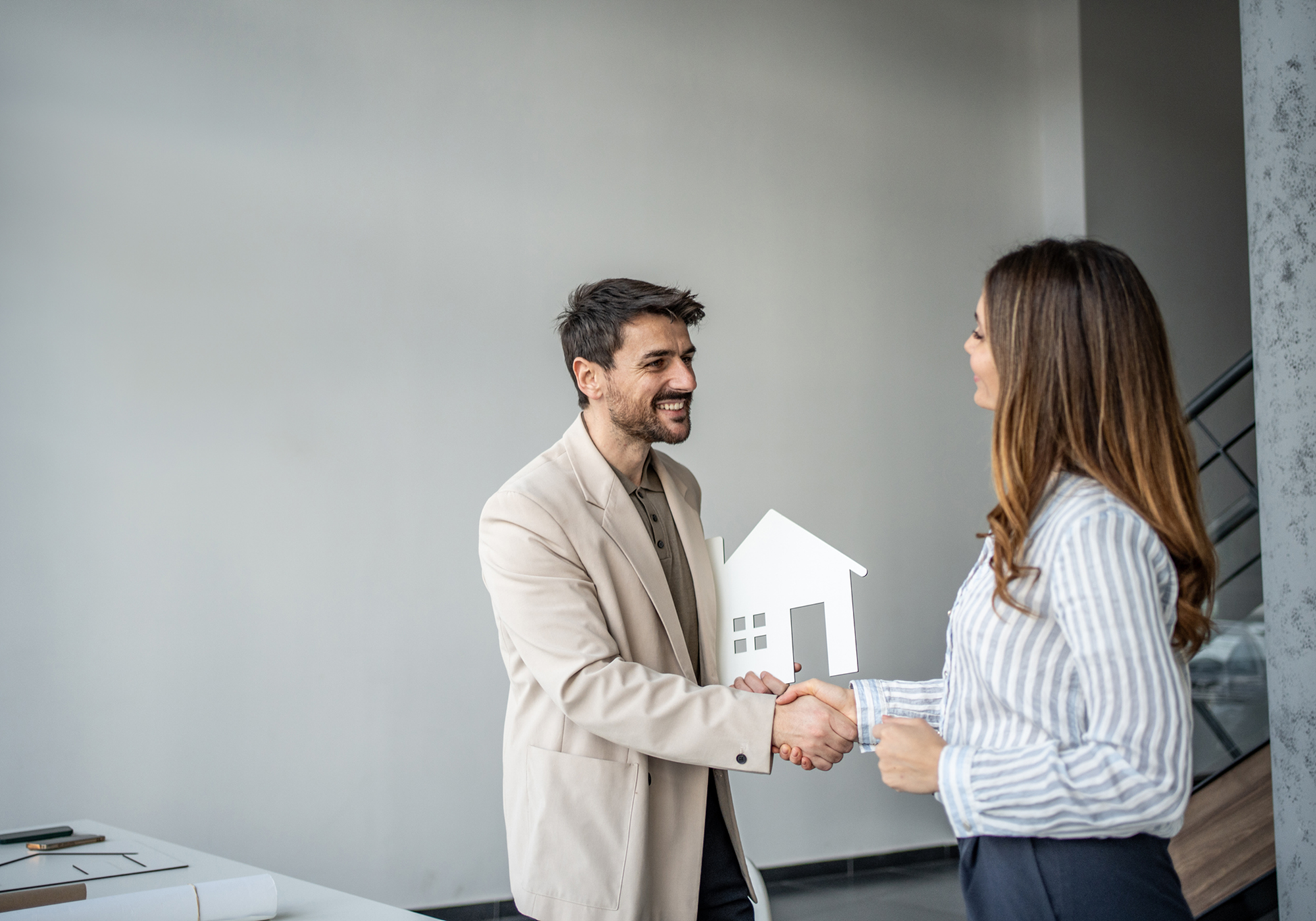 Real estate agents shaking hands