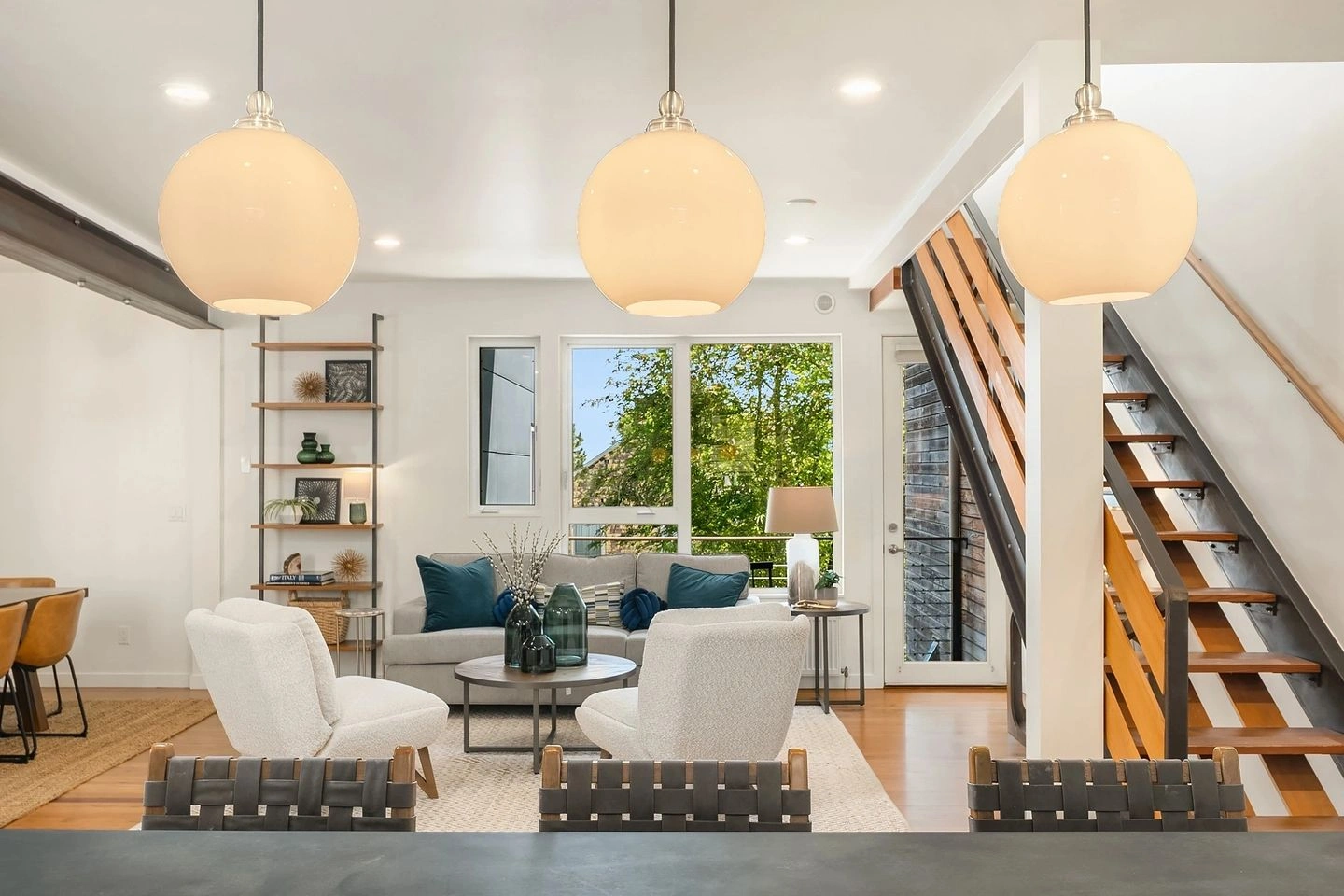 Bright modern living room with pendant lights